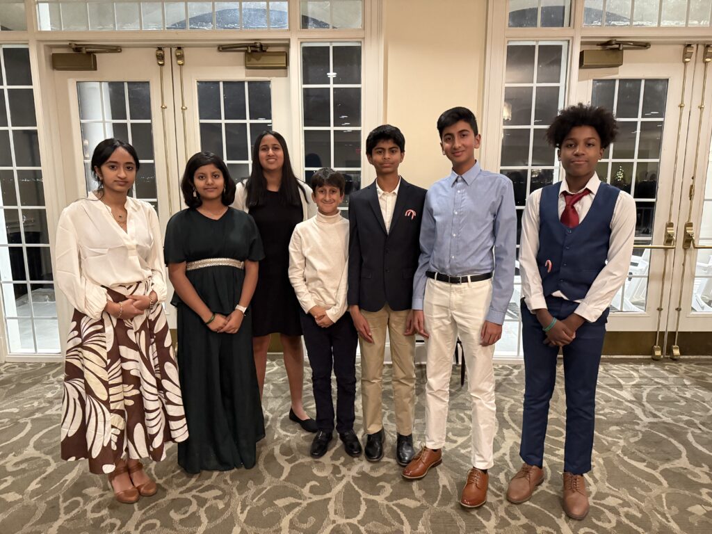 From left, Vaishnavi Kortikere, Pranamya Jindal, Prisha Shah, Arsalan Riar, Shreyas Kalidindi, Muhammad Husain, and Justin Morgan from the Young Entrepreneurs Academy during the Loudoun awards gala on December 5, 2024, at the Belmont Country Club in Ashburn, Virginia. PHOTO: T. Vishnudatta Jayaraman, SAH