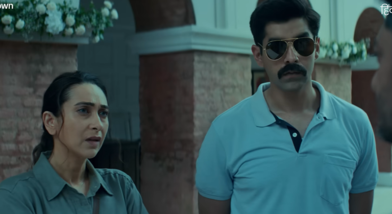 Karisma Kapoor and Surya Sharma in Brown. PHOTO: Trailer Video Grab
