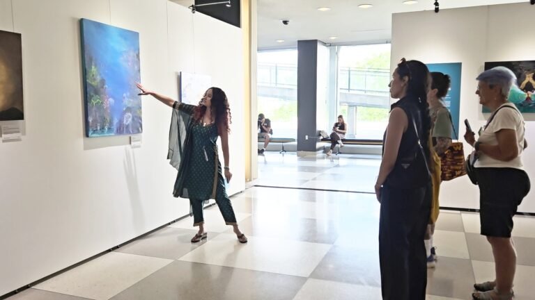 Namita Kulkarni explaining to guests about one of her paintings at the United Nations, in New York. PHOTO: Namita Kulkarni