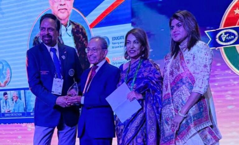Dr. Navin C. Shah receiving the Architect of AAPI and Champion of Foreign Medical Graduates Equality Award. PHOTO: AAPI