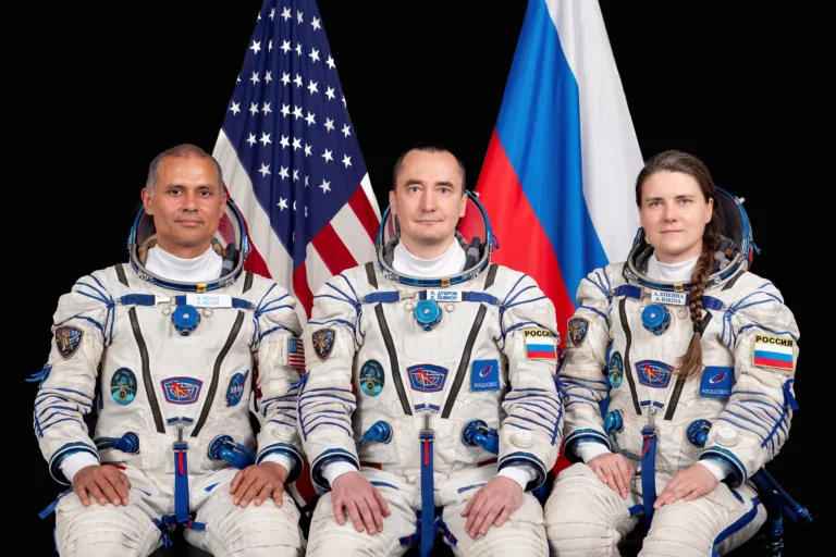 NASA astronaut Anil Menon and Roscosmos cosmonauts Pyotr Dubrov and Anna Kikina, Soyuz MS-29 prime crew members, pose for a portrait at the Gagarin Cosmonaut Training Center in Russia. PHOTO: GCTC