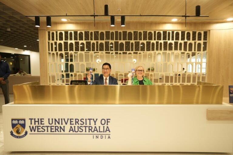 Vice-Chancellor Professor Amit Chakma and Jennifer Howell, Deputy Vice Chancellor, Global Engagement, hold University of Western Australia identification cards at the university's Mumbai campus, August 28, 2026. PHOTO: Nashid Chowdhury, Director, Global Growth and Advocacy, UWA