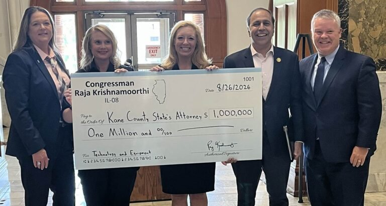 Congressman Raja Krishnamoorthi presents Kane County leaders with a check commemorating the funding he secured for the county’s digital forensic efforts, strengthening investigations and prosecutions. PHOTO: Congressman Krishnamoorthi’s Office