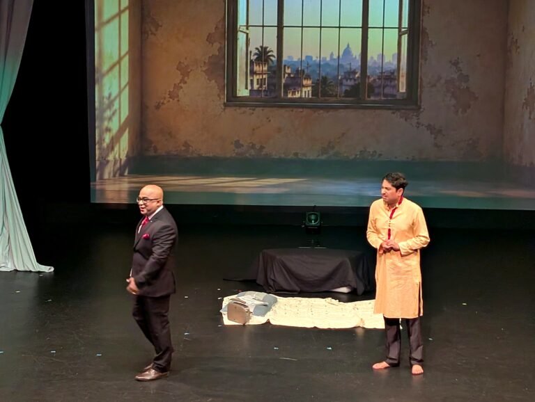 Supriya Guha as Mr. Jin, the genie, appears to Subrata as Aniket in his modest Kolkata room in Rangmanch Production's The Mystic Lamp at Nexus Theatre, Perth, October 4, 2026. PHOTO: Pooja Bhardwaj, SAH