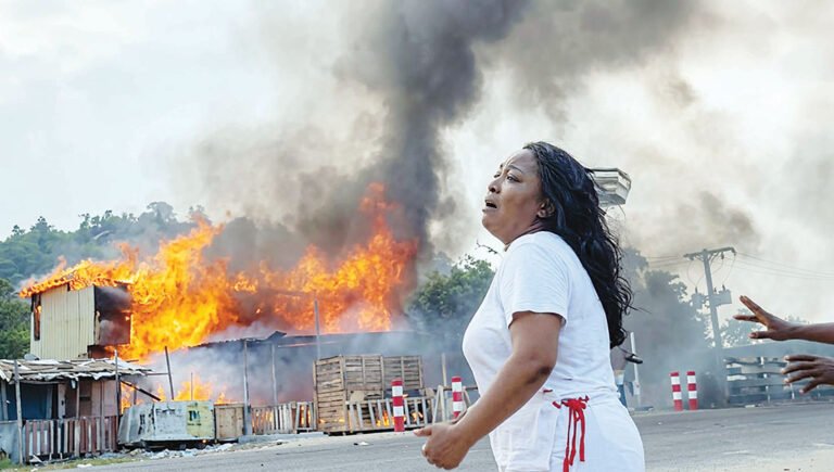 A woman reacts in anguish near the site of a severe blaze at Tuptup Resto and Resort at Patuartek of Inani Beach in Cox’s Bazar on Saturday. The fire killed at least 10 tourists. PHOTO: Author
