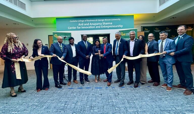 Anil Sharma and Anupama Sharma take part in the ribbon cutting ceremony along with President of George Mason University Gregory Washington, and leaders of GMU’s Costello College of Business on October 5, 2026, at GMU campus in Fairfax, Virginia. PHOTO:  T. Vishnudatta Jayaraman, SAH